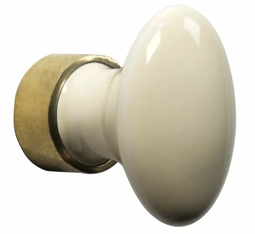 Goedkoop Meubelknop ovaal porselein 42mm ivoor/messing ongelakt